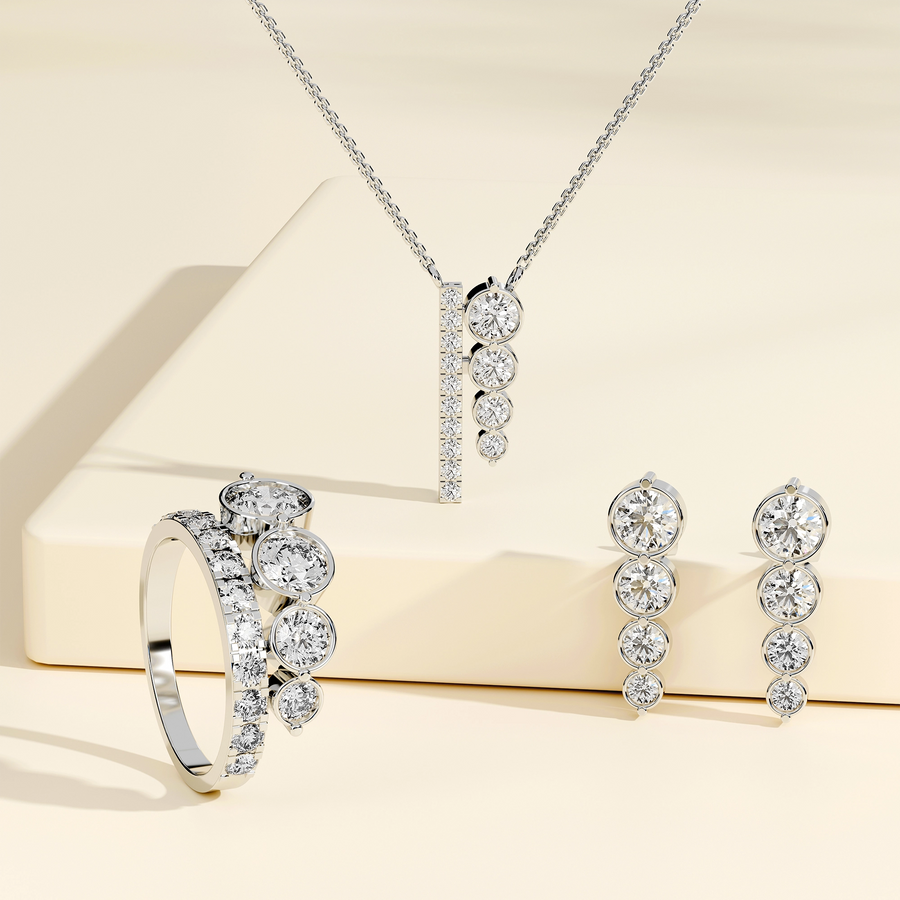 6.75 ct graduated bezel lab grown diamond jewellery set with round pendant, drop earrings and statement ring