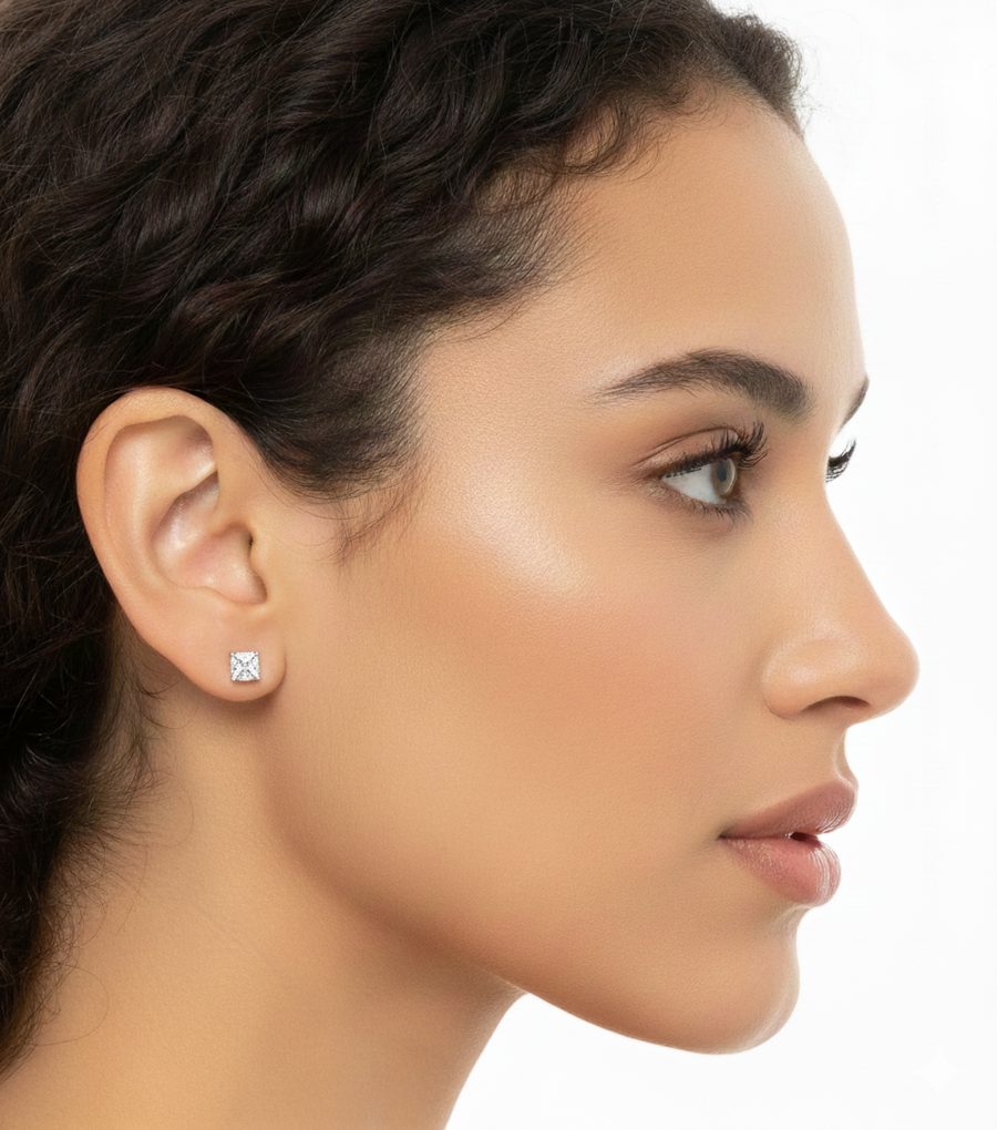 2.24 CT cushion lab-grown diamond stud earrings worn