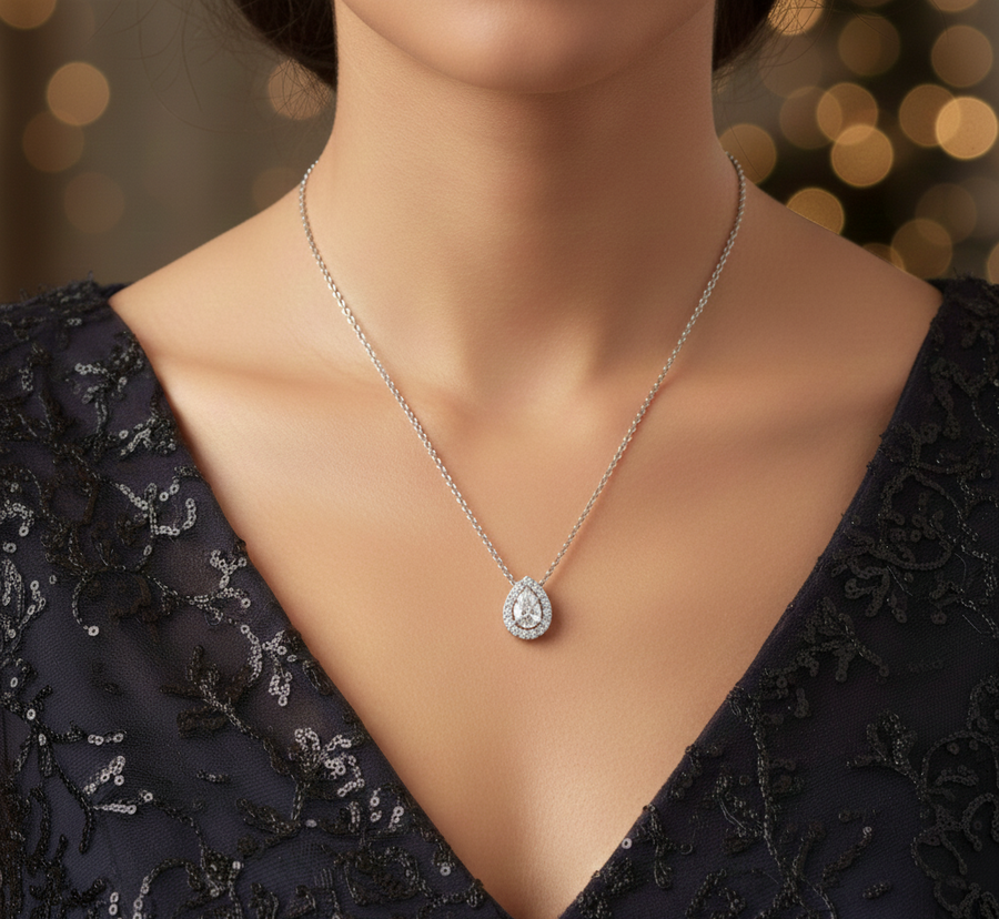 0.32 CT pear halo lab-grown diamond pendant worn