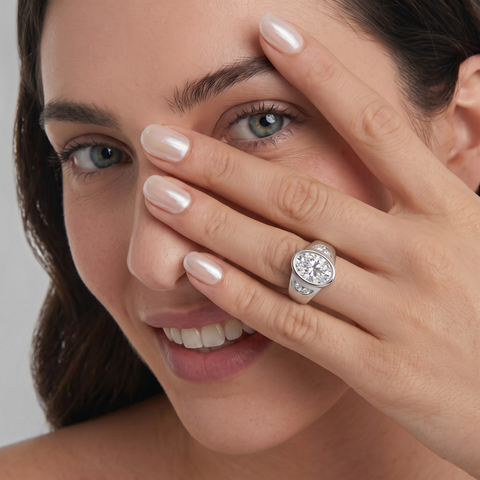 1.60 Ct Oval Bezel Diamond Ring with Side Diamond