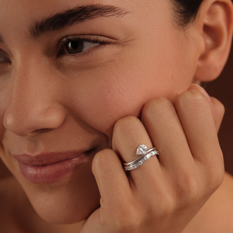 1.51 Ct Pear Solitaire With Baguettes Bypass Ring