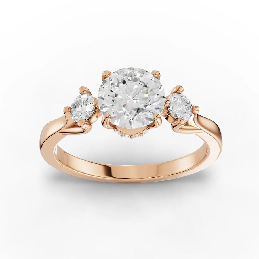 Rose gold three-stone diamond ring