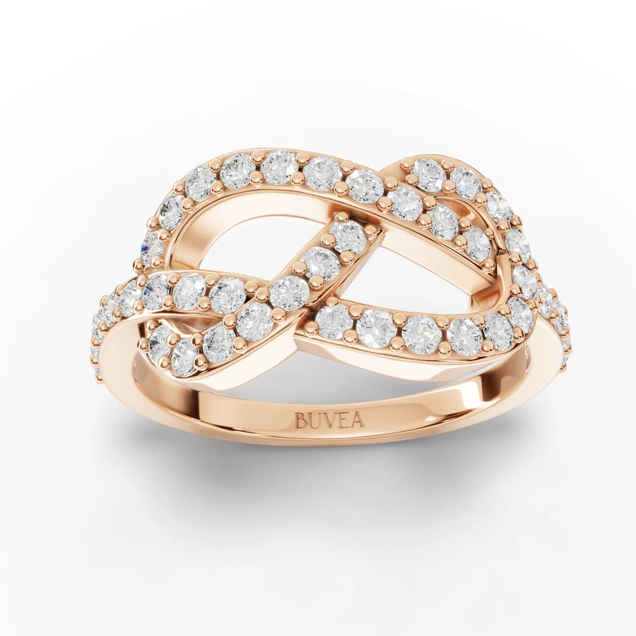 18K rose gold infinity motif ring featuring 0.53 CT round lab-grown diamonds in a intertwined design with pavé detailing.