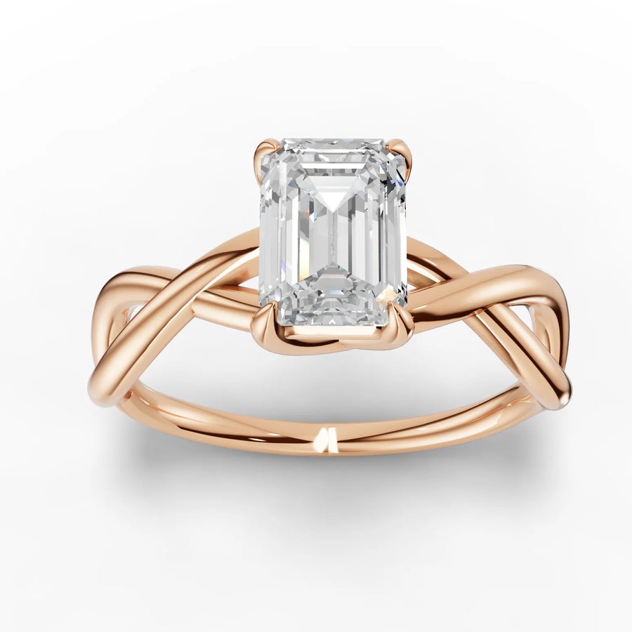 Rose gold emerald solitaire ring