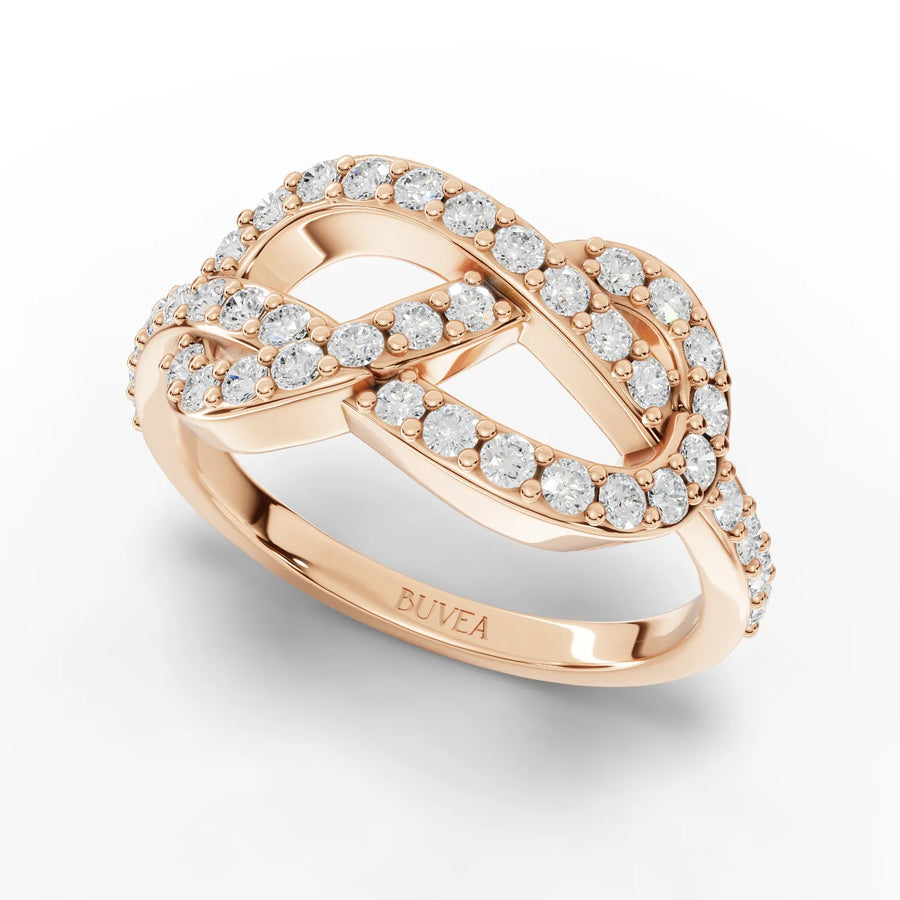 0.53 CT infinity motif lab diamond ring in 18K gold, featuring round diamonds in a twisting pave design.