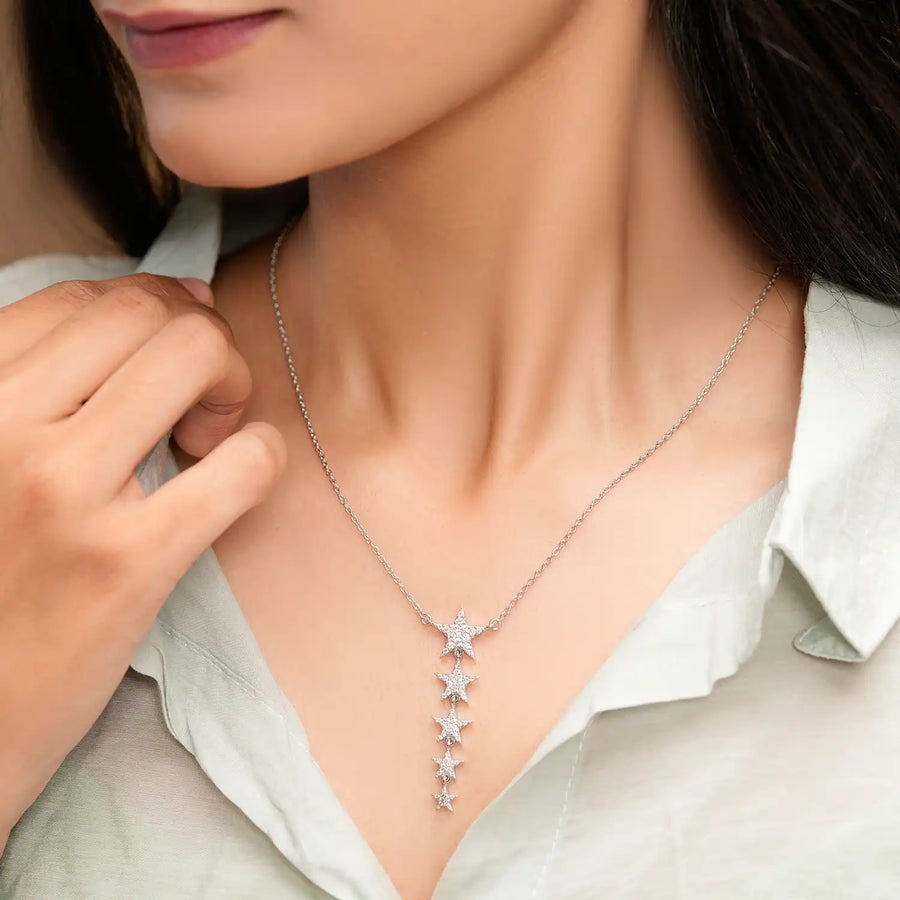 Close-up of pendant on neckline