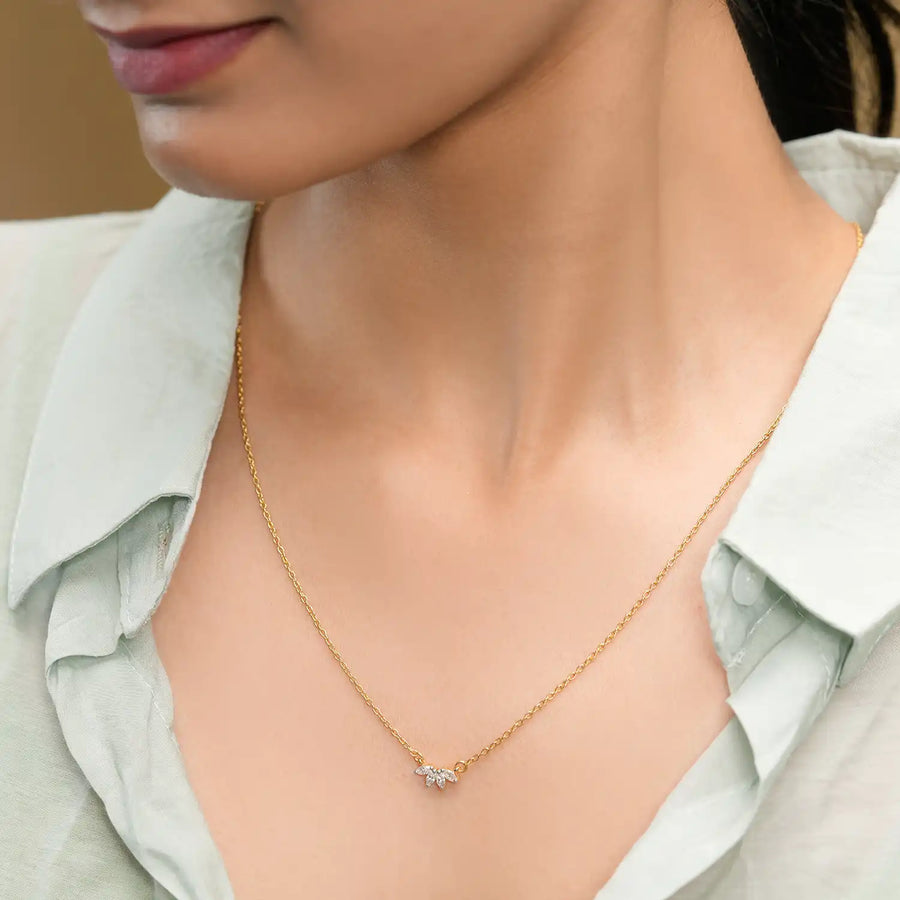 Model wearing marquise cluster diamond pendant