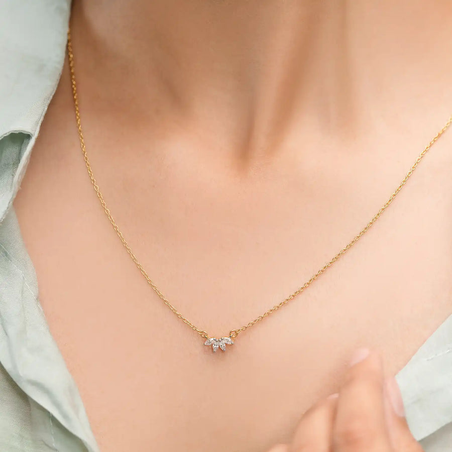 Close-up on neckline showing cluster motif