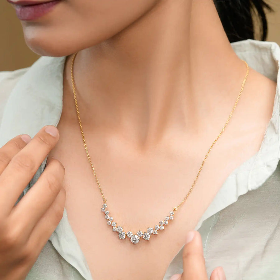 Close-up on model's neckline showing V curve brilliance