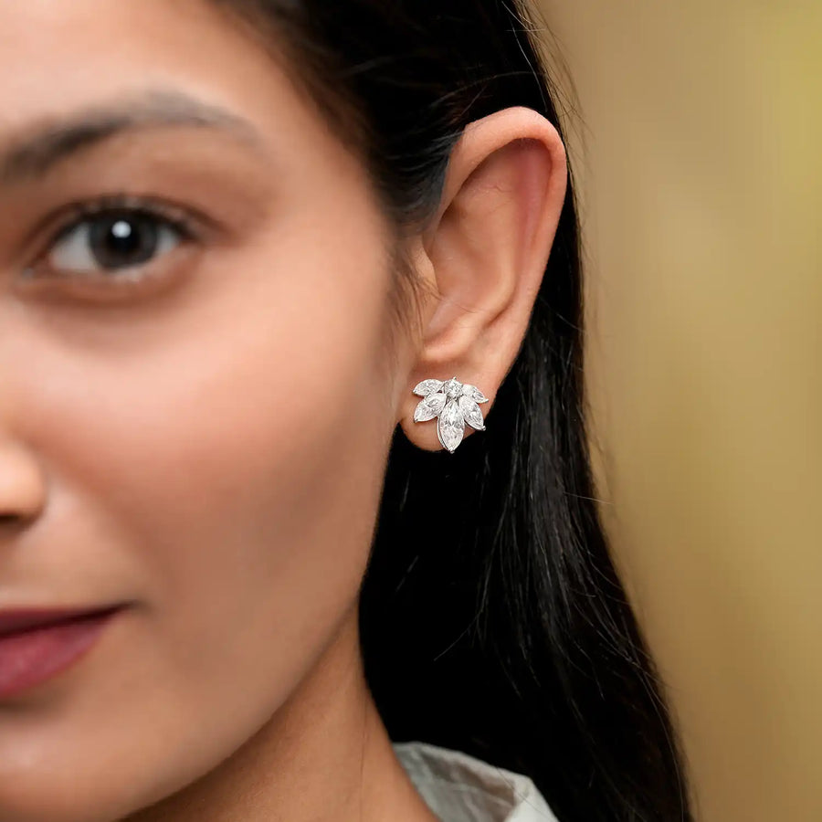 Model wearing marquise floral diamond earrings