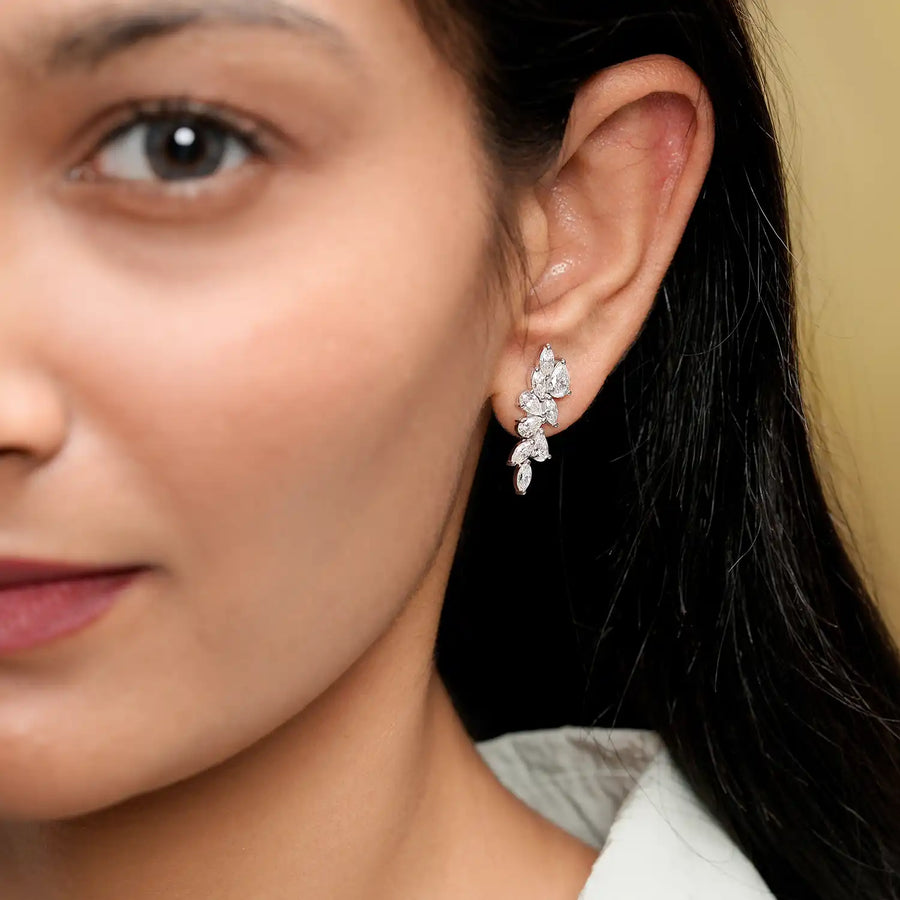Model wearing marquise pear cascade earrings
