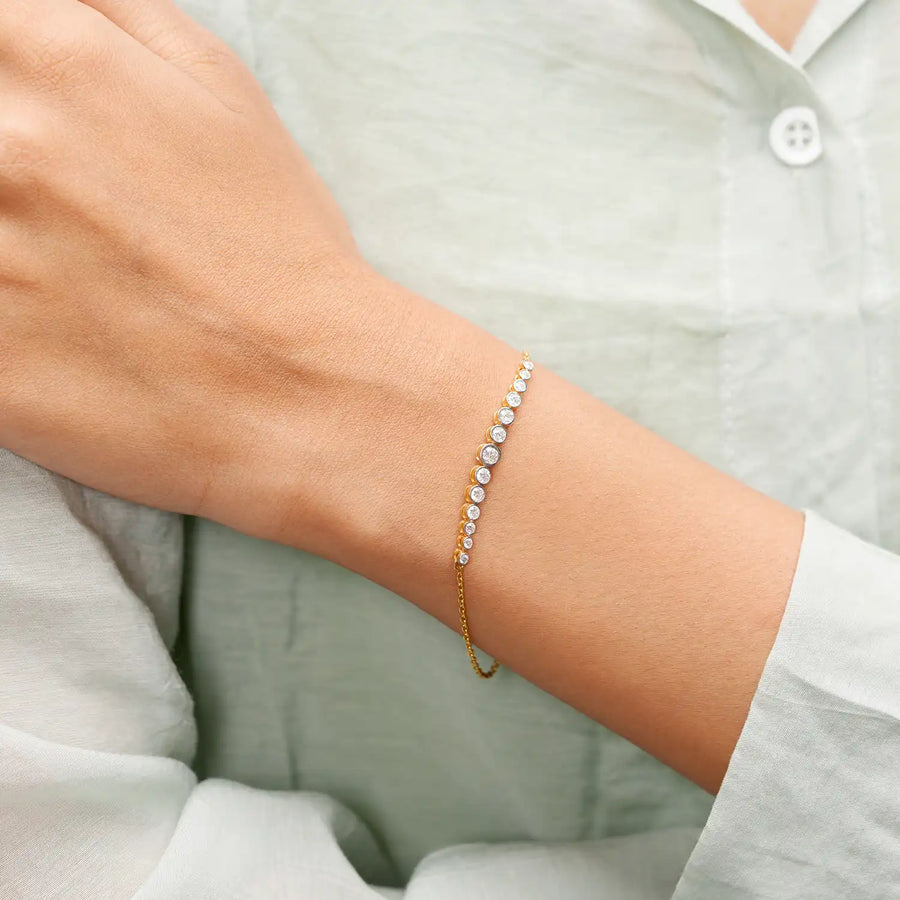 Wrist close-up showing graded stones