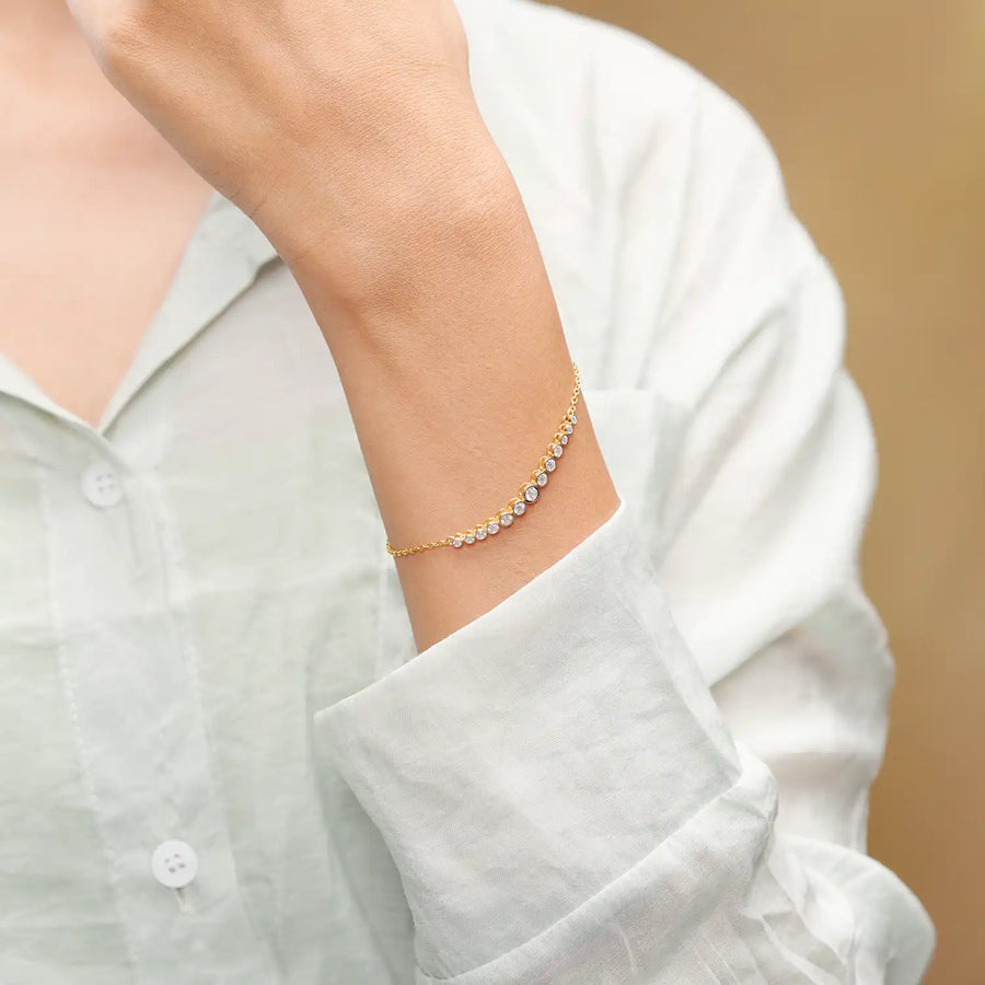 Model wearing gradient bezel diamond bracelet