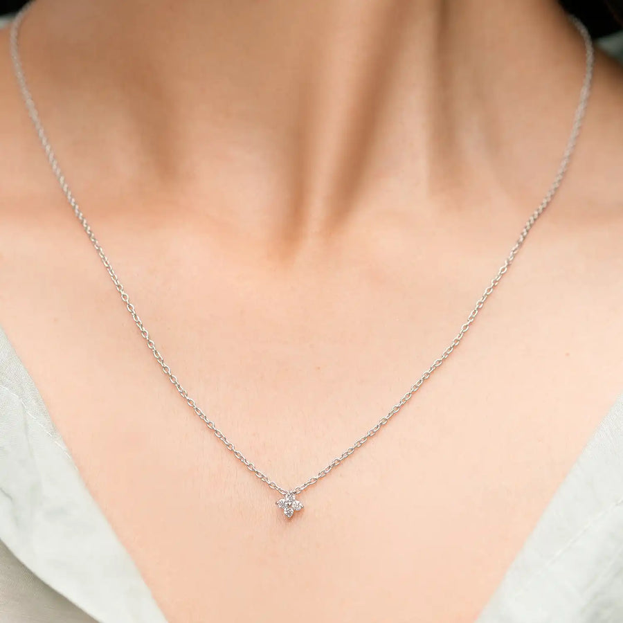 Close-up showing pendant on neckline