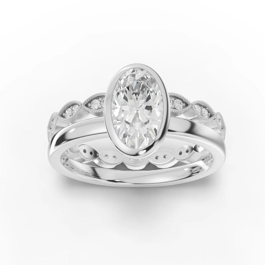 1.66 ct oval bezel pavé set lab diamond ring with 1.50 ct center stone and eternity accent band
