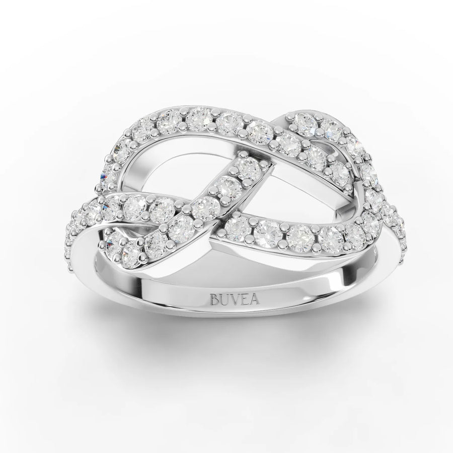 Infinity motif lab diamond ring in 18K white gold, featuring round diamonds in micro-prong settings and a sleek, intertwining design.
