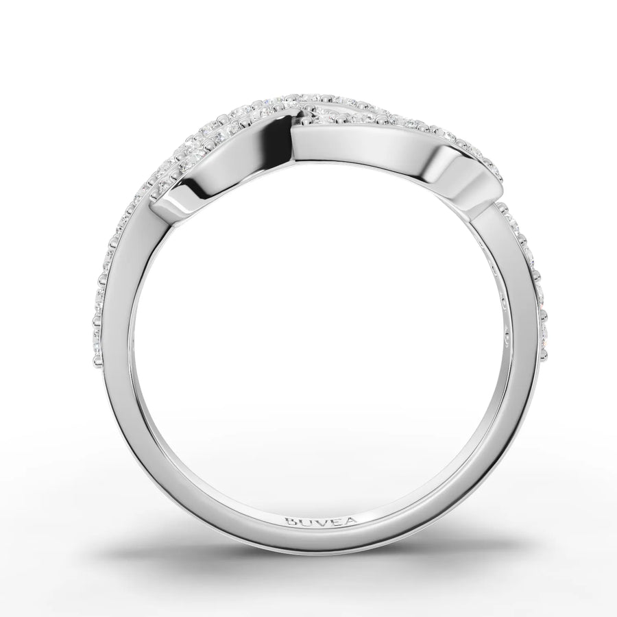 18K gold infinity motif lab diamond ring featuring pavé detailing and a smooth band with round diamonds along the curves.