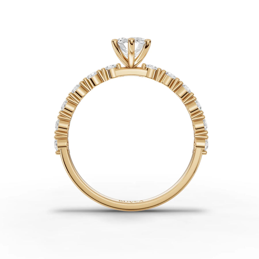 Marquise center stone ring yellow gold close-up