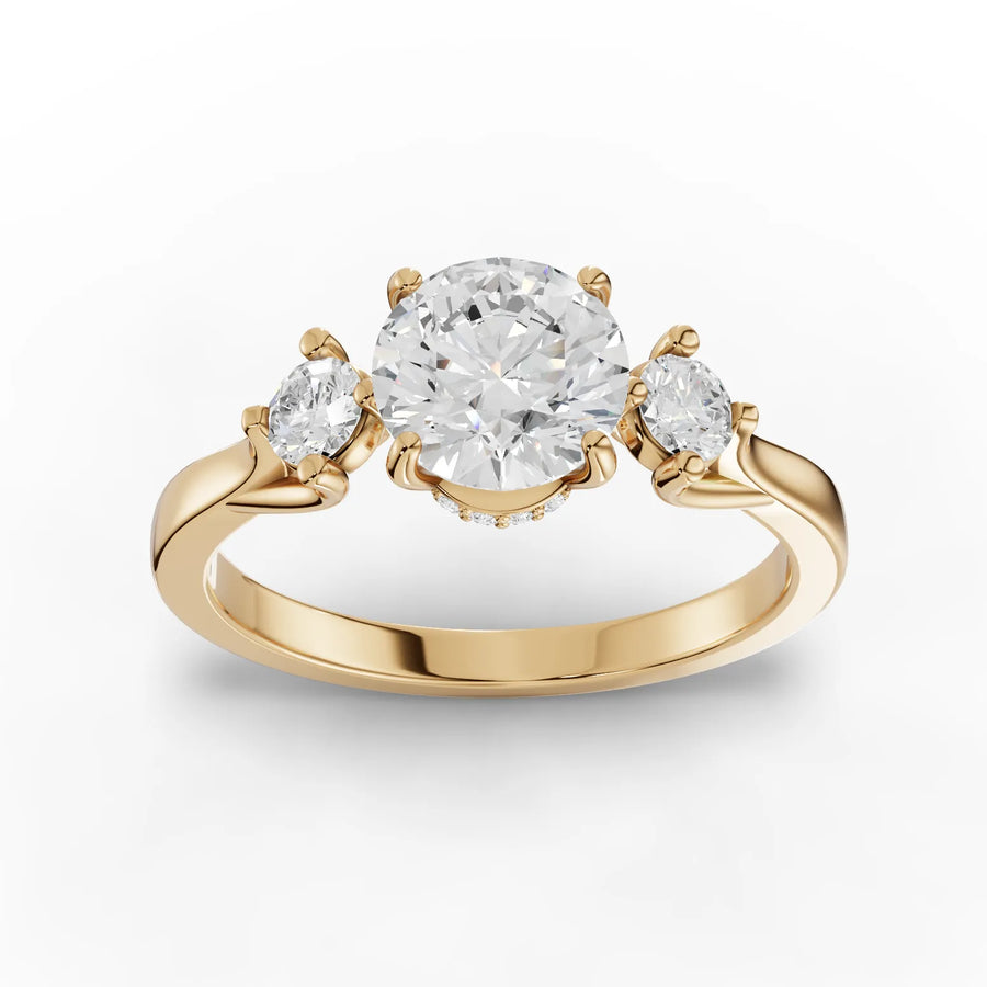 Yellow gold three-stone ring
