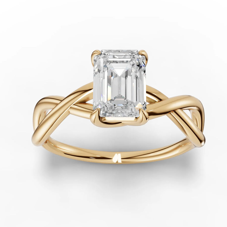 Yellow gold emerald diamond ring