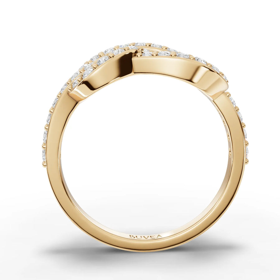 18K gold infinity motif diamond ring featuring pavé detailing, with round lab-grown diamonds along the curved band.