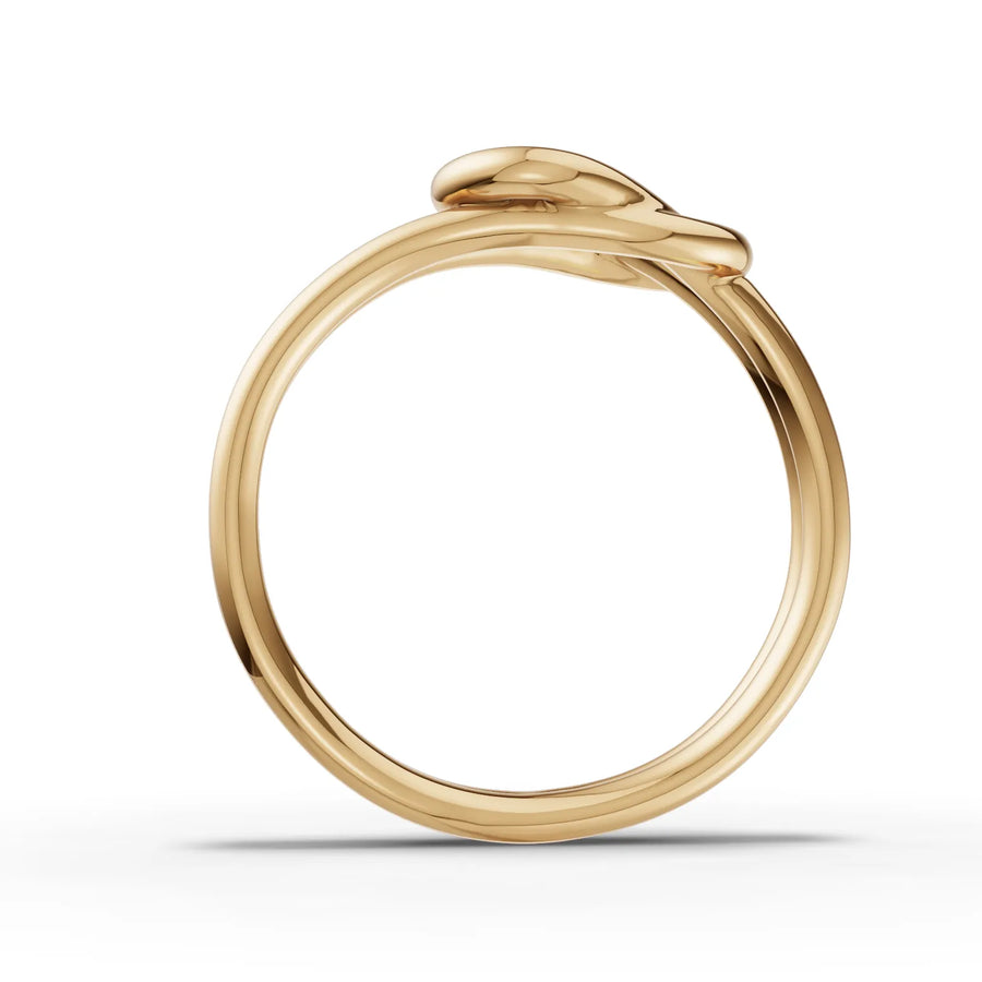 Lab-grown round solitaire ring yellow gold close-up