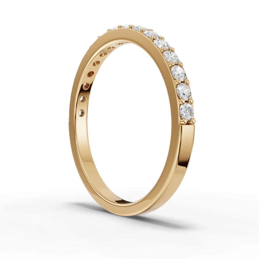 Lab-grown diamond half eternity band yellow gold close-up