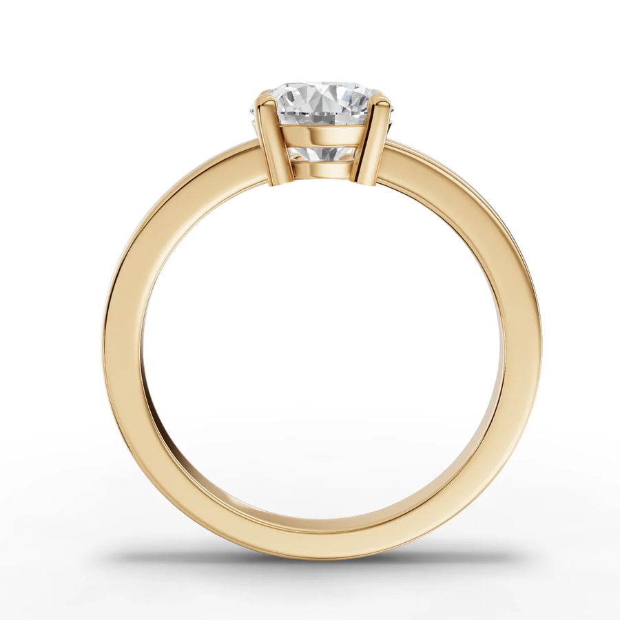 Lab-grown round solitaire ring yellow gold close-up