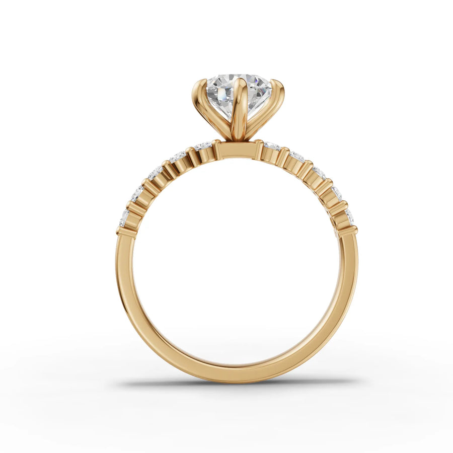 Lab-grown round solitaire ring yellow gold close-up