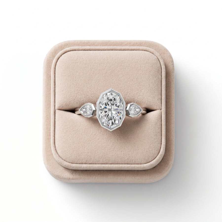 1.20 Ct Oval Bezel Three Stone Lab Grown Diamond Ring
