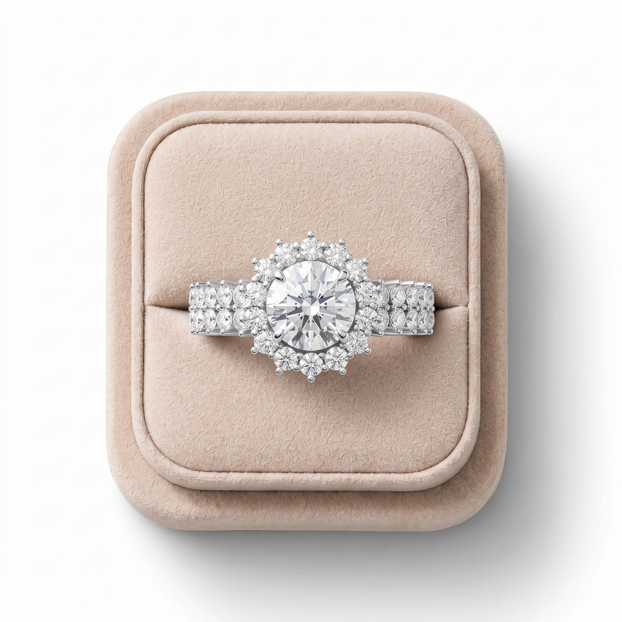 Round halo lab diamond ring features a central diamond with a sparkling accent setting on a split shank band.