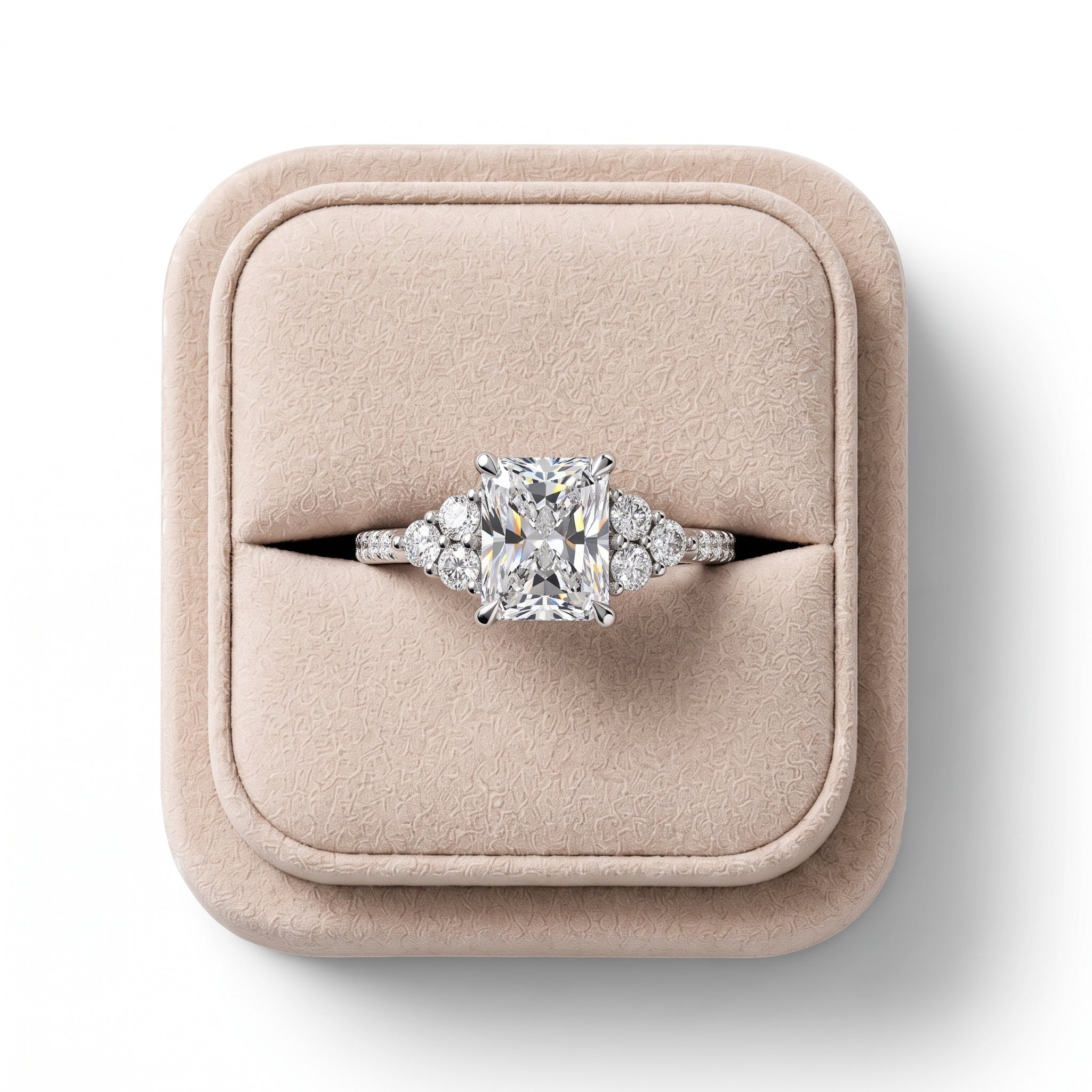 Radiant 1.5 CT lab grown diamond center ring in 18K gold, featuring round diamond halo and accent stones on the shoulders.