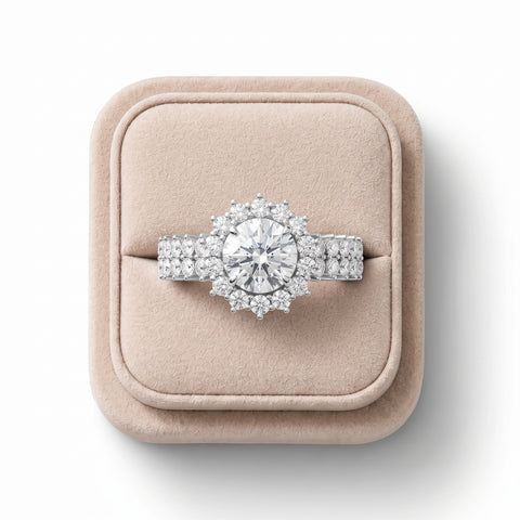Round halo lab diamond ring features a central diamond with a sparkling accent setting on a split shank band.