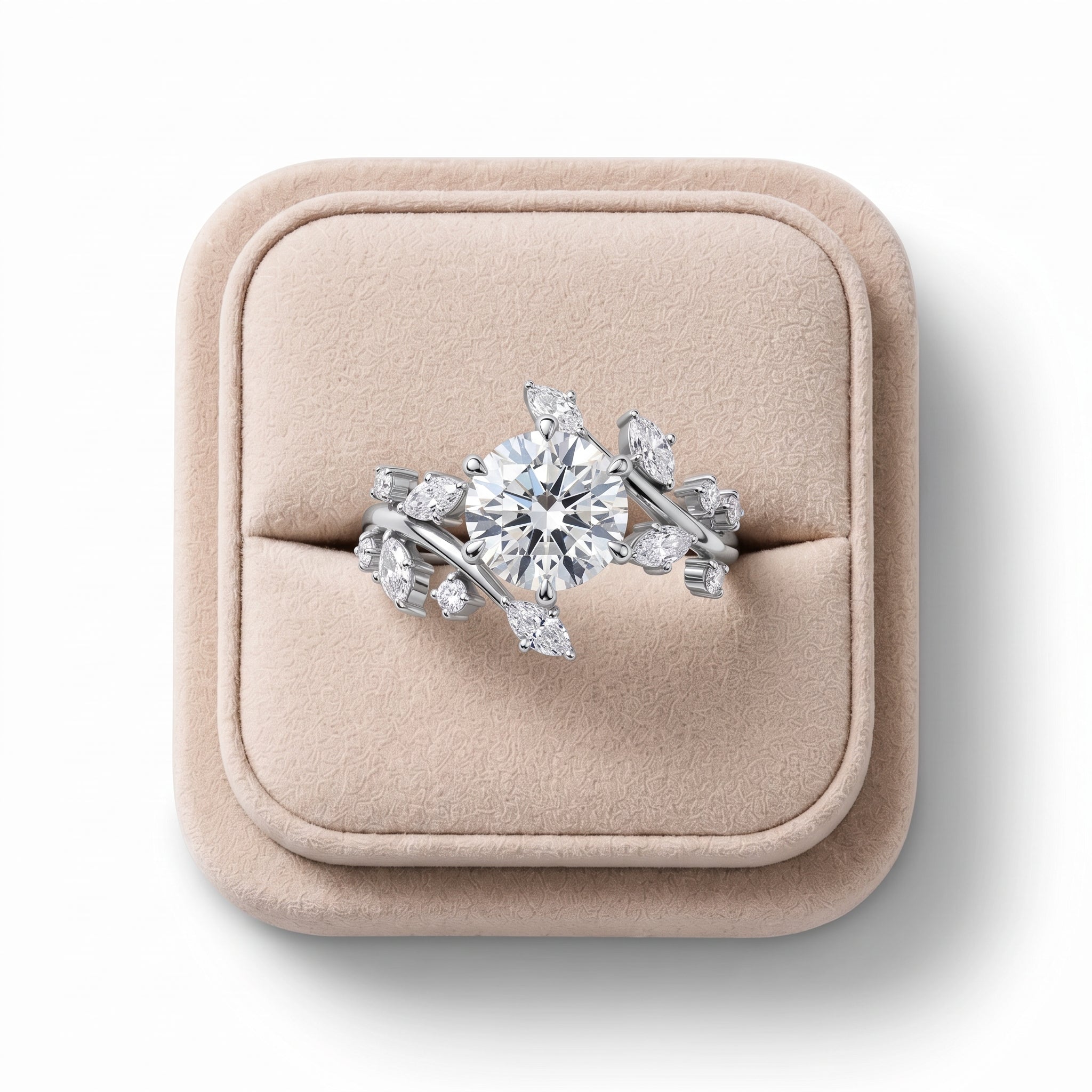 Round solitaire ring featuring a 2 CT lab grown diamond center, accented by marquise and round diamonds, set in 18K gold.