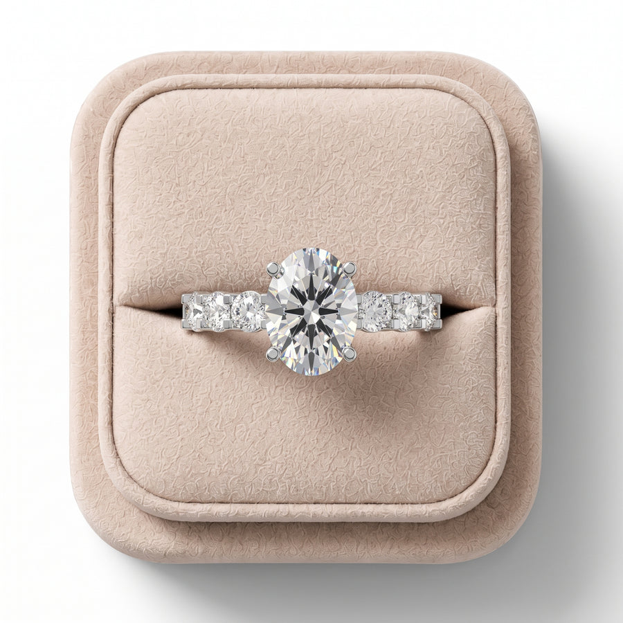 1.99 CT oval lab diamond ring featuring a prominent center stone with tapered side stones, set on a sleek band.
