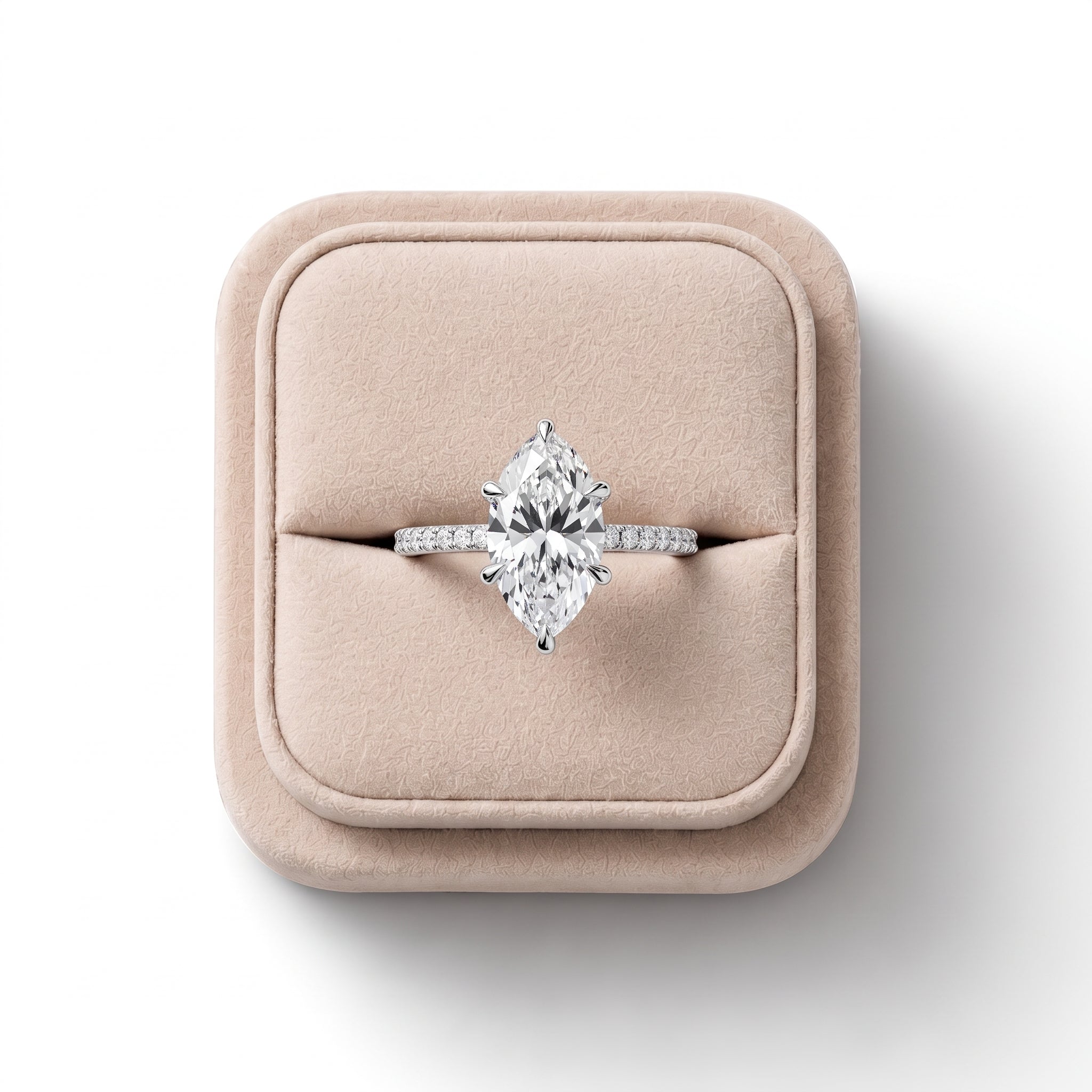 Lab grown diamond ring featuring a 2.5 CT marquise center stone in a six-prong setting; smooth band with hidden halo accents.