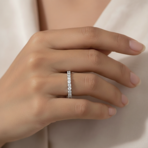 0.72 CT round lab-grown diamond eternity ring worn on hand