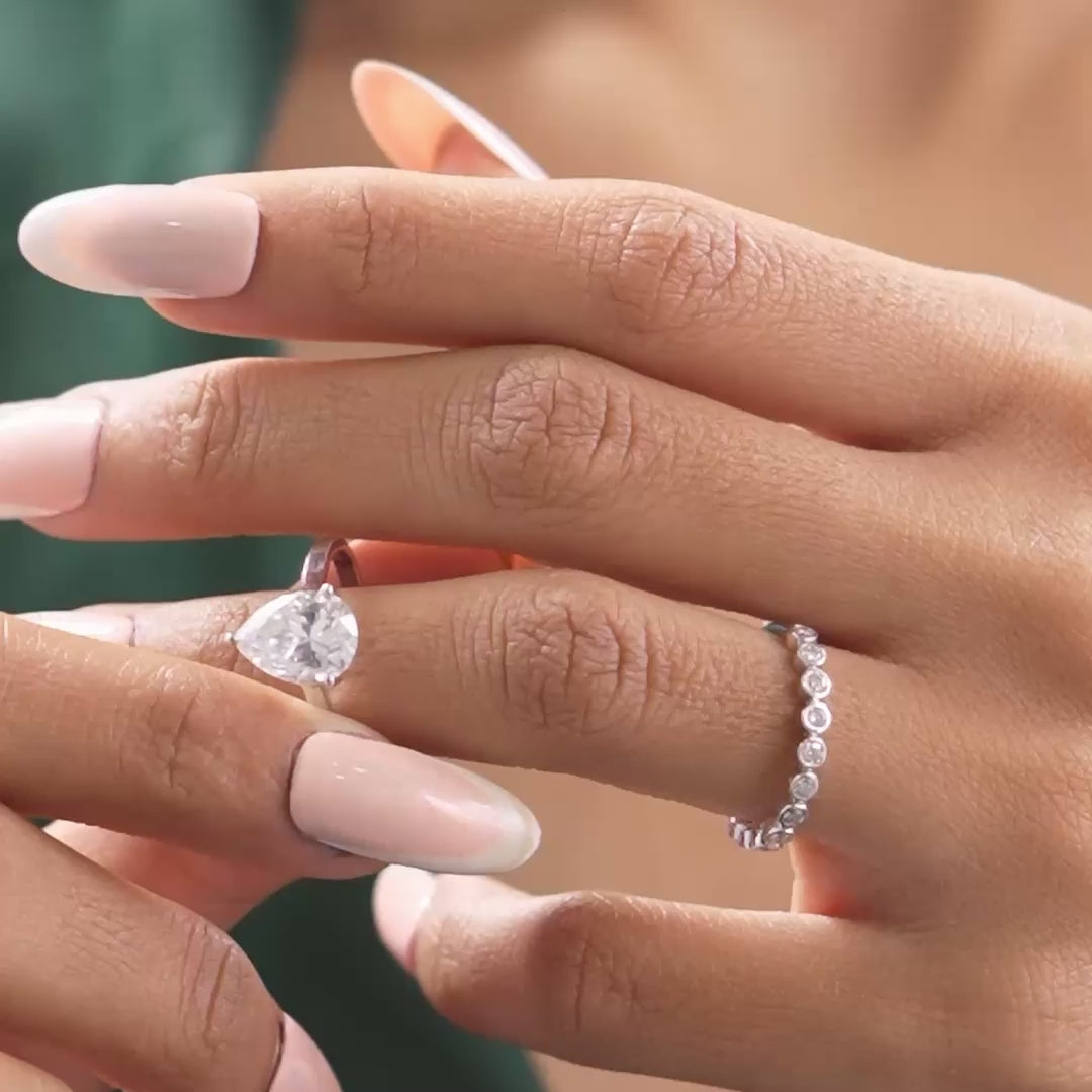 Model wearing 2.94 CT pear lab-grown diamond bridal set video clip