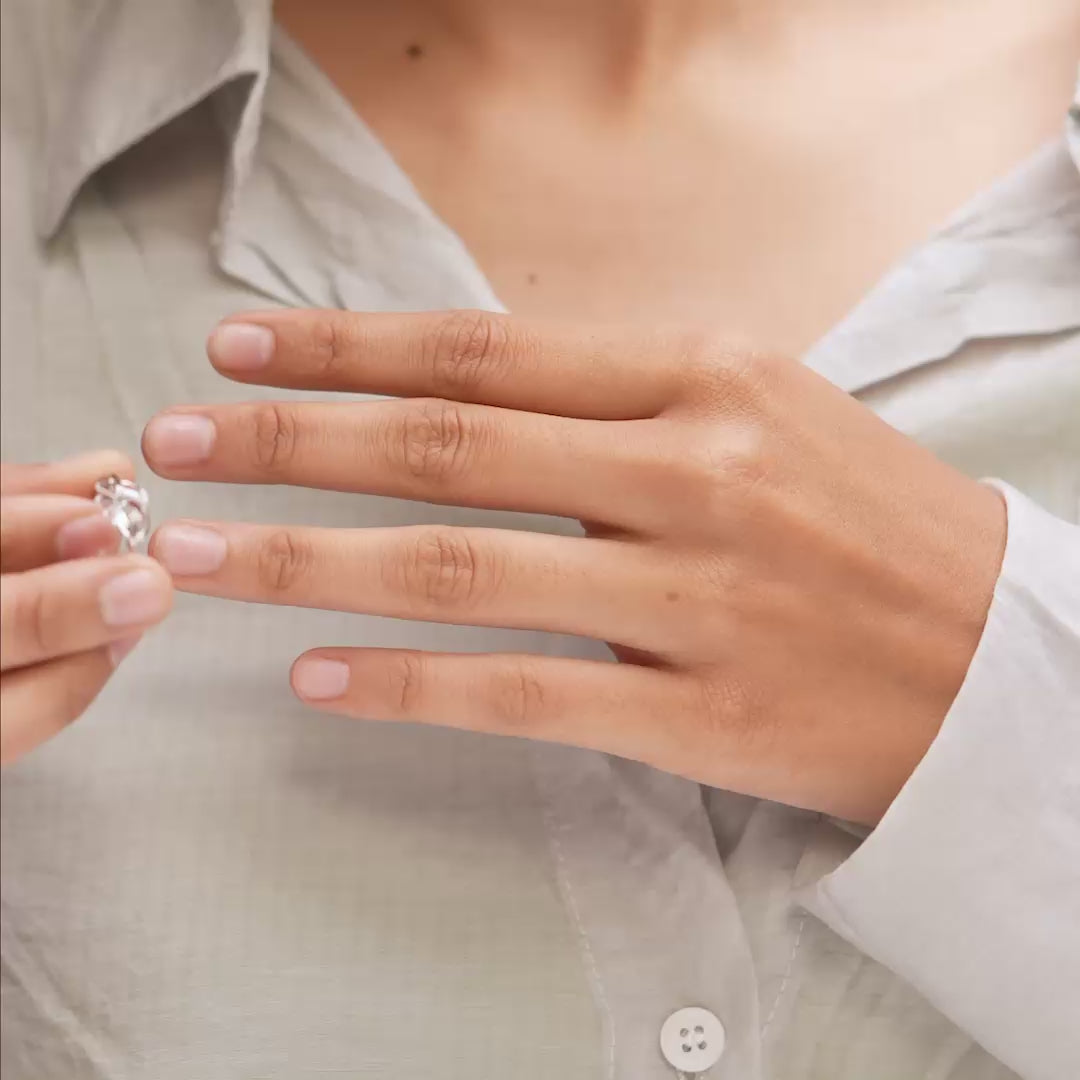 Model wearing 0.06 CT sparkle plume lab-grown diamond ring video clip