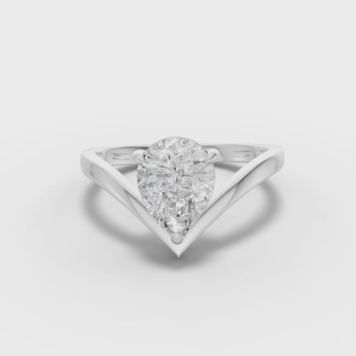 360° rotation video of pear diamond wedding band