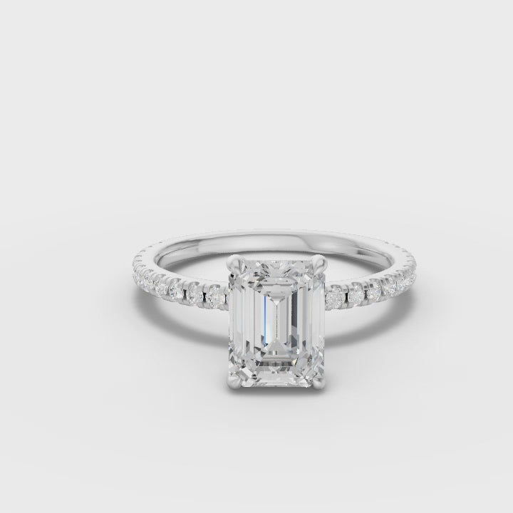360° rotation video of emerald pavé ring