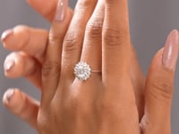 Model wearing round halo lab-grown diamond ring video clip