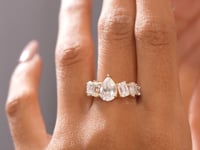 Model wearing 4.50 CT pear center lab-grown diamond ring video