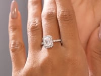 Model wearing 2.34 CT emerald cut halo lab-grown diamond ring video