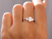Model wearing 1.50 CT oval three-stone lab-grown diamond ring video