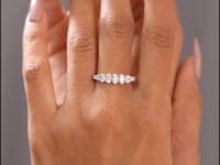 Model wearing 1.34 CT oval diamond band lab-grown ring video