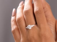 Model wearing 1.79 CT oval three-stone lab-grown diamond ring video