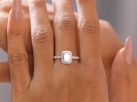 Model wearing 1.26 CT emerald cut halo lab-grown diamond ring video