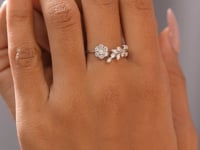 0.29 CT open floral motif lab-grown diamond ring worn on hand