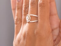 Model wearing round crossover split-shank lab-grown diamond ring video